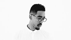 Black & white headshot of rapper, producer & poet Amir Mohamed el Khalifa, or ODDISEE