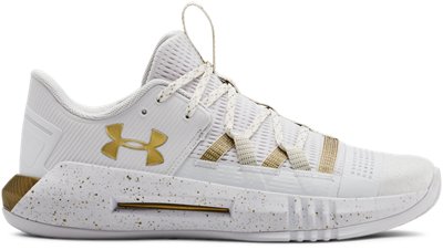 white and gold under armour volleyball shoes