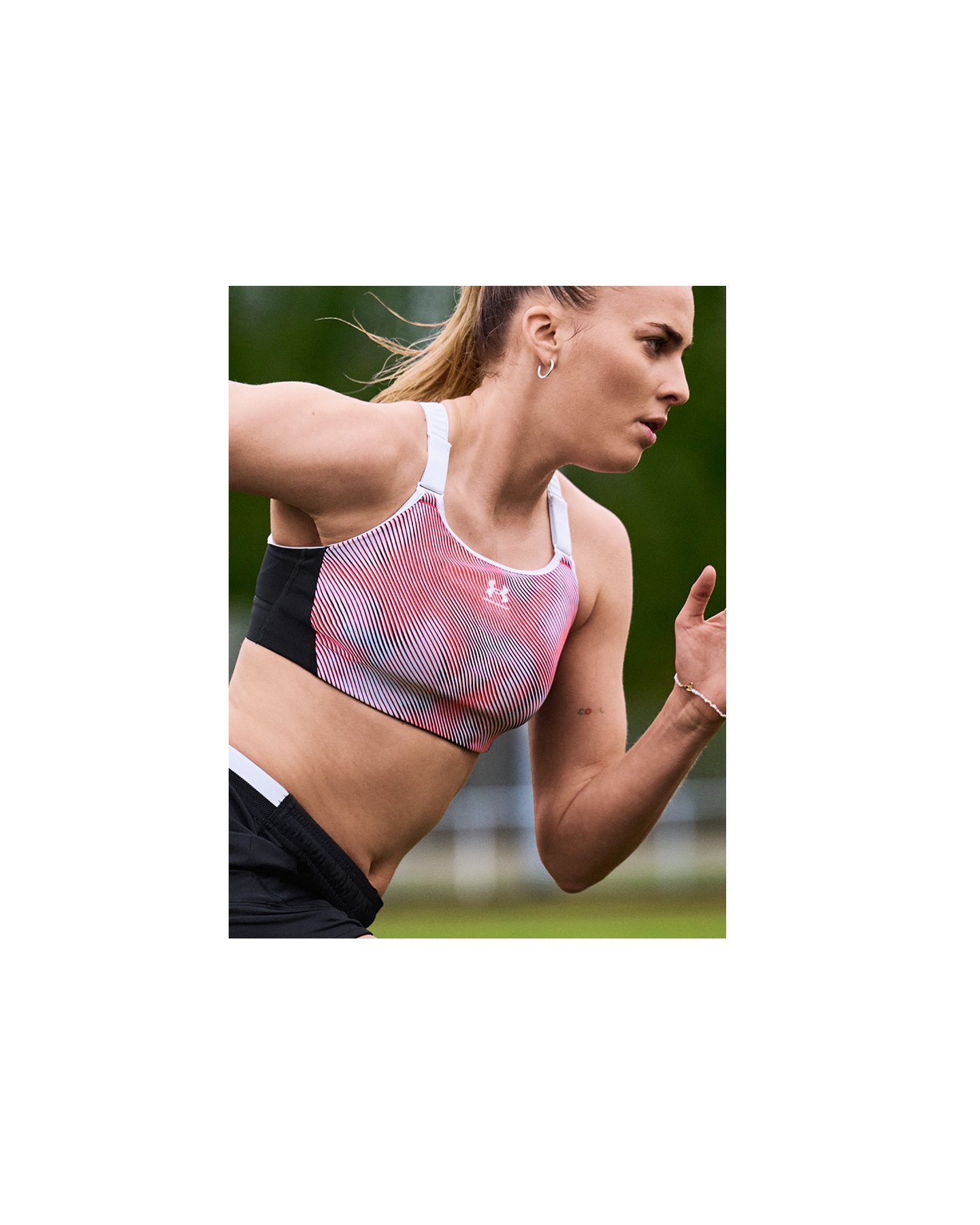 Women's sports bra with Williams on the left chest and Women Of Williams  signature striping across the front and back. Black with white trim. Was  $39.99.