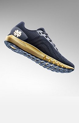 navy blue and gold under armour shoes