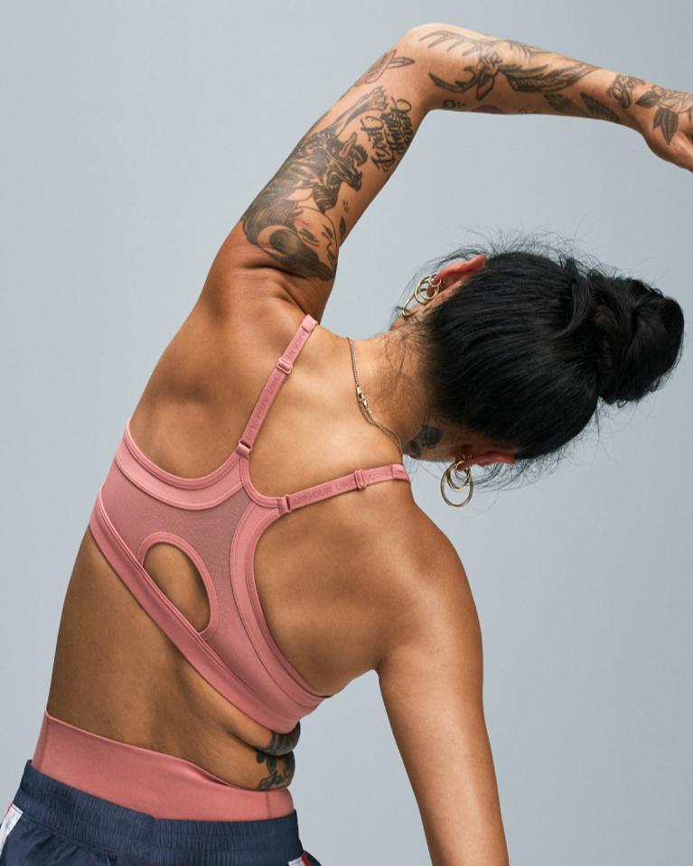 Woman in pink sports bra​
