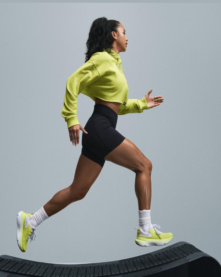 Woman running in crop jacket​