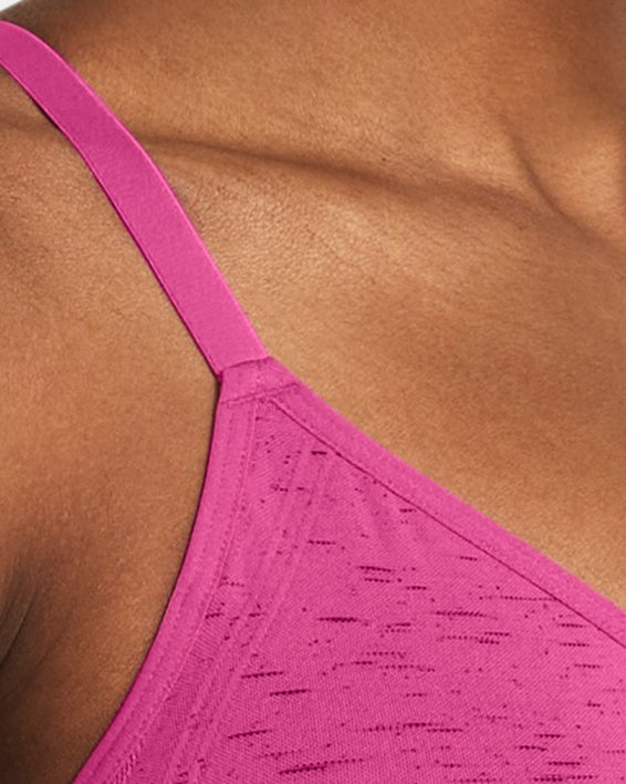 Women's UA Seamless Low Long Heather Sports Bra in Pink image number 0