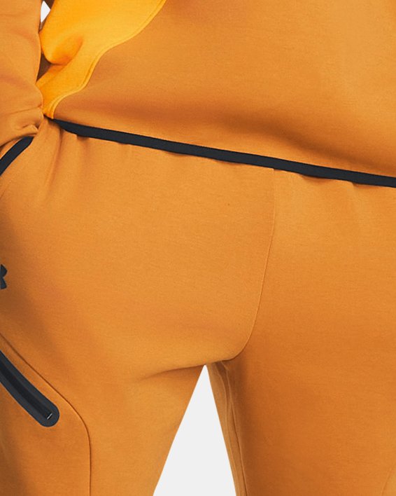 Men's UA Unstoppable Fleece Joggers in Orange image number 2